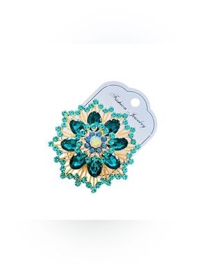 Gold Tone Starburst Rhinestone Brooch